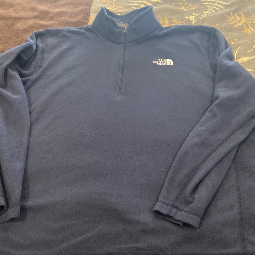 The North Face fleece top.   Dark blue.   Wash and wear.    XL woman’s